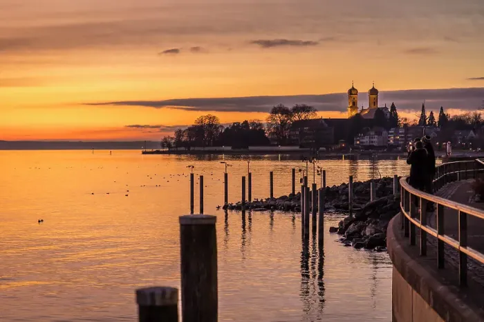 Framed Print : Sunset on the shore of Friedrichshafen with Castle Church, Baden-Wurttemberg, Germany Framed Print : Sunset on the shore of Friedrichshafen with Castle Church, Baden-Wurttemberg, Germany