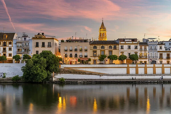Sunset view of Triana neighbourhood and Guadalquivir river, Seville, Andalusia, Spain