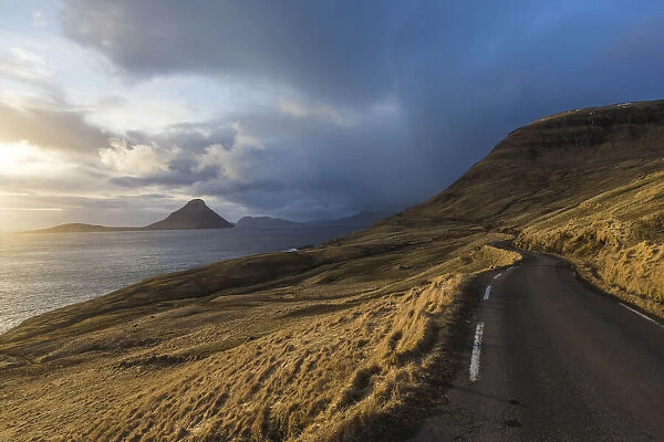 Sunset on the west coast of Streymoy island. The island of Koltur in the background. Faroe islands