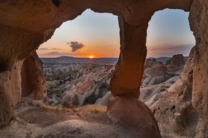 Framed Print : Sunsetscape from tuff cave between the hills of Red valley Framed Print : Sunsetscape from tuff cave between the hills of Red valley