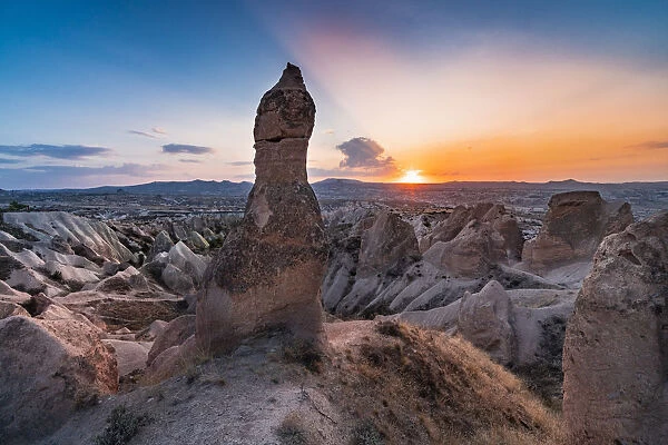 Sunsetscape from tuff rock formations in Red valley. Goreme, Capadocia, Kaisery district