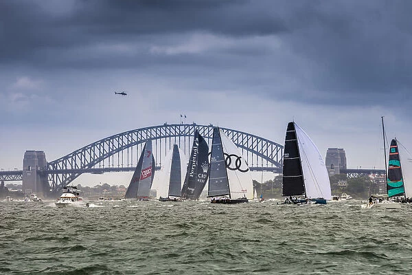 Super maxi yachts competing in the SOLAS Big Boat Challenge on Sydney Harbour, Sydney