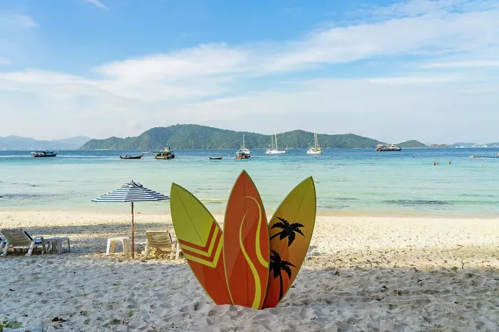 Framed Print : Surf boards on the beach on Raya Island, Thailand