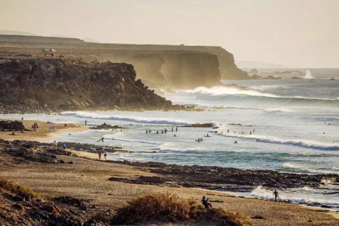 Framed Print : Surfers in El Cotillo coastline, Fuerteventura, Canary Islands. Spain Framed Print : Surfers in El Cotillo coastline, Fuerteventura, Canary Islands. Spain