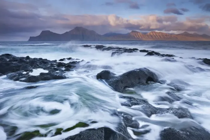 Framed Print : Surging waves break over the rocky shores at Gjogv on the island of Eysturoy, Faroe Islands Framed Print : Surging waves break over the rocky shores at Gjogv on the island of Eysturoy, Faroe Islands