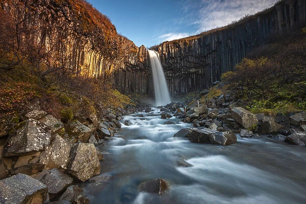 Svartifoss waterfall at sunrise, Skaftafell National Park, Hornafjorður, Austurland, Iceland, Northern Europe