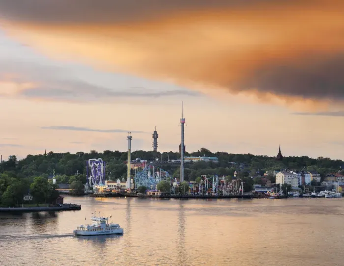 Framed Print : Sweden, Stockholm, Grona Lund Tivoli, passenger ferry in bay at dusk Framed Print : Sweden, Stockholm, Grona Lund Tivoli, passenger ferry in bay at dusk