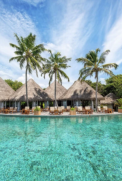 Swimming pool and a bar on a luxury resort, Baa Atoll, Maldives