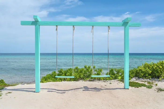 Framed Print : Swing set over-looking the Caribbean Sea, Grand Cayman, Cayman Islands, British West Indies Framed Print : Swing set over-looking the Caribbean Sea, Grand Cayman, Cayman Islands, British West Indies