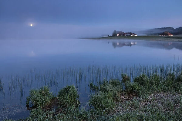 Switzerland, Canton of Neuchatel, Lake Tailleres, Moonset