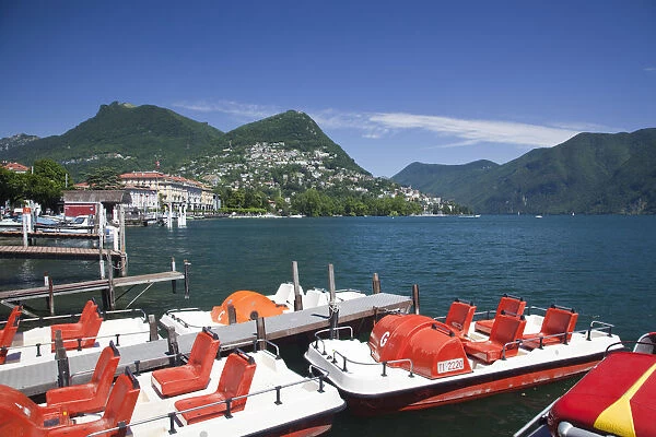 Switzerland, Ticino, Lake Lugano, Lugano, lakefront with paddleboats