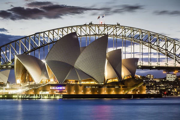 Sydney Opera House and Sydney Harbour Bridge at dusk, Sydney, New South Wales, Australia