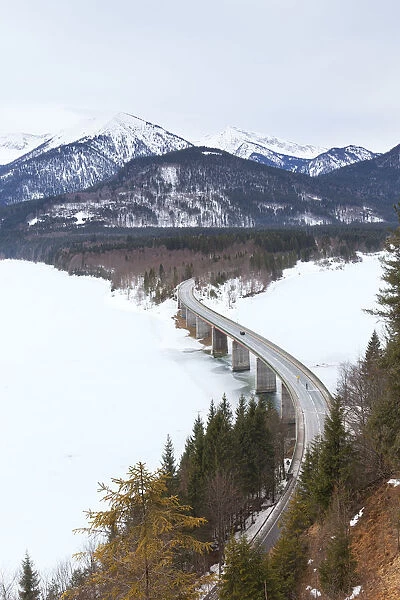 Sylvenstein bridge on frozen lake Sylvensteinsee, Lenggries, Bad T√∂lz-Wolfratshausen district, Upper Bavaria, Germany