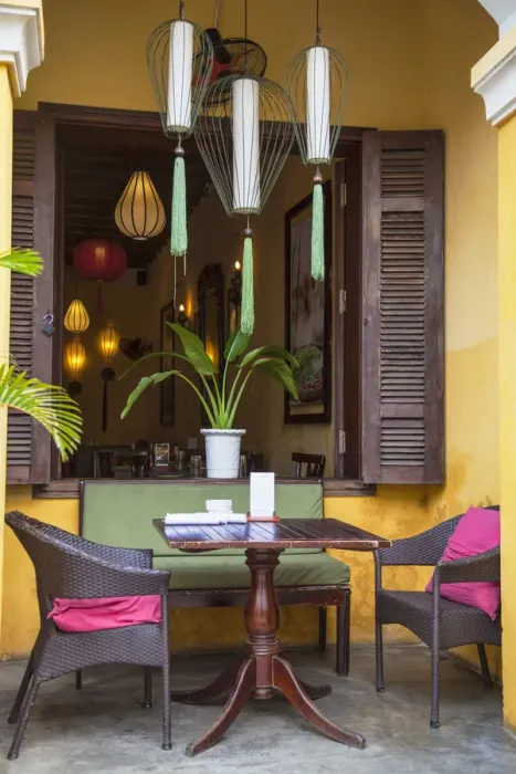 Framed Print : Table outside cafe, Hoi An (UNESCO World Heritage Site), Quang Ham, Vietnam Framed Print : Table outside cafe, Hoi An (UNESCO World Heritage Site), Quang Ham, Vietnam