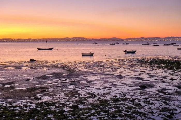 Framed Print : Tagus river at low tide. On the other bank of the river is the city of Lisbon. Alcochete, Portugal