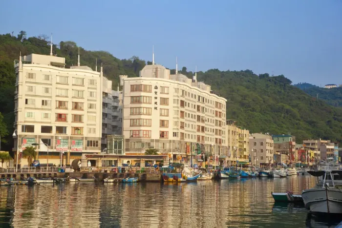 Framed Print : Taiwan, Kaohsiung, Gushan, Modern Riverside appartments near ferry terminal