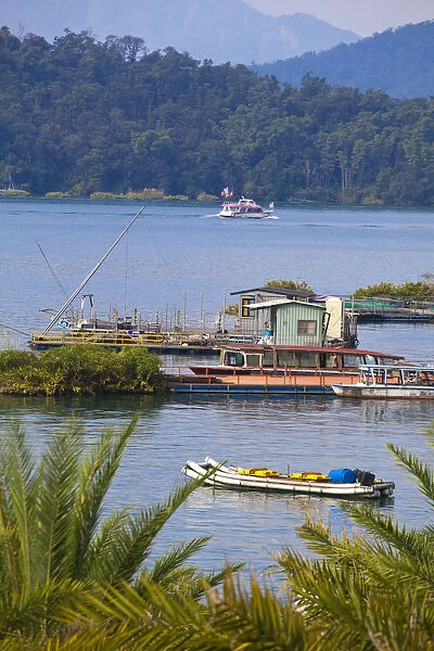 Taiwan, Nantou, Fishing boats on Sun Moon Lake