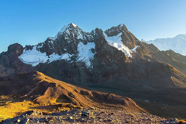 Takusiri mountain (5350 m) and Laguna Pucacocha in Andes at sunrise, near Uchullujllo, Pitumarca district, Canchis Province, Cuzco Region, Peru