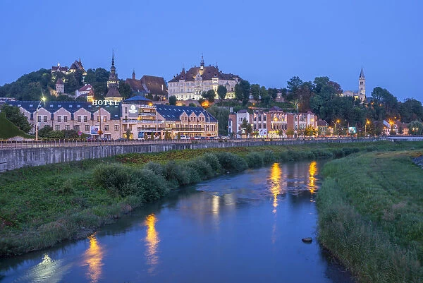 Tarnava Vare river with the old town of Sighisoara at dawn, Unesco World Heritage Site, Transylvania, Romania