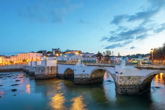 Framed Print : The Tavira Roman Bridge over the River Gilao at Dusk, Tavira, Algarve, Portugal Framed Print : The Tavira Roman Bridge over the River Gilao at Dusk, Tavira, Algarve, Portugal