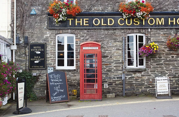 Telephone box outside pub, Padstow, Cornwall, England
