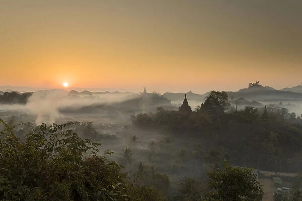 Temple in the mist at dawn, Mrauk U, Burma, Myanmar