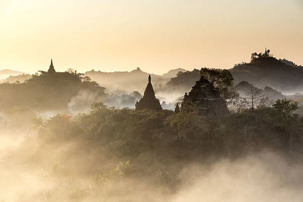 Temple in the mist at dawn, Mrauk U, Burma, Myanmar