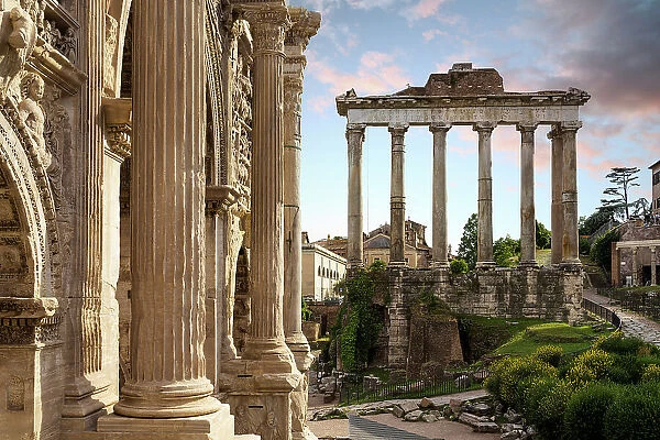 The Temple of Saturn and arch, part of Roman Forum, Rome, Italy