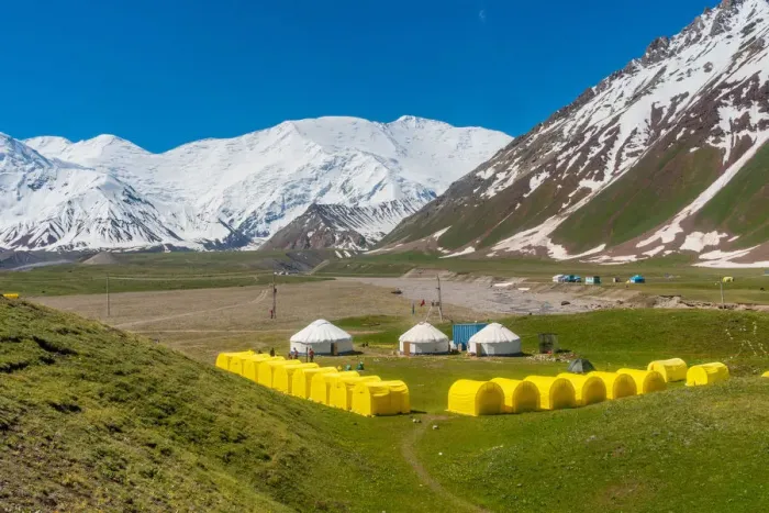 Framed Print : The tents of peak Lenin base camp with Lenin peak in the background Framed Print : The tents of peak Lenin base camp with Lenin peak in the background