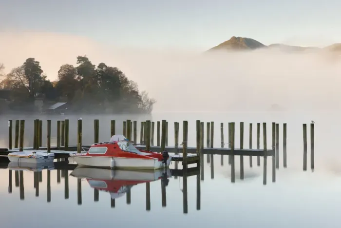 Framed Print : Tethered boats on Derwent Water on a misty morning, Lake District National Park, Cumbria