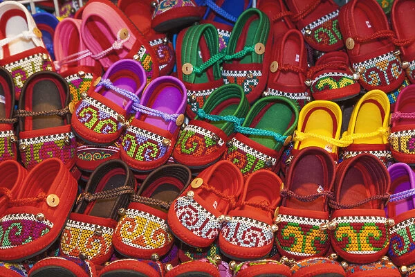 Thailand, Bangkok, Chatuchak Market, Shop Display of Ethnic Childrens Shoes