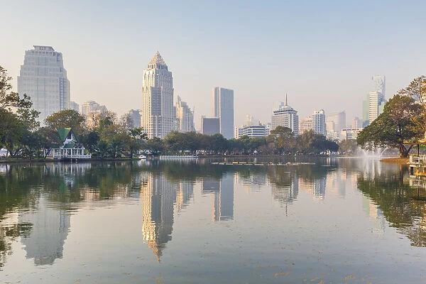 Thailand, Bangkok, Lumphini Area, Lumphini Park, city skyline at dawn