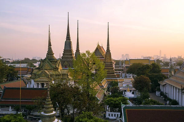 Thailand, Bangkok. Wat Pho complex, elevated view, at sunrise