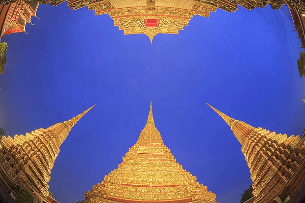 Thailand, Bangkok, Wat Pho (UNESCO Site), low angle view of the three main Chedi