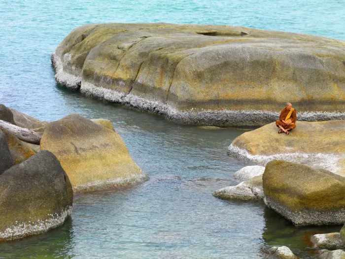 Framed Print : Thailand, Ko Samui, Monk resting on rocks Framed Print : Thailand, Ko Samui, Monk resting on rocks