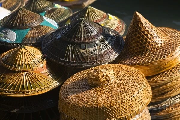 Thailand, Samut Songkhram, Damnoen Saduak. Traditional hats for sale at the Damnoen Saduak floating market