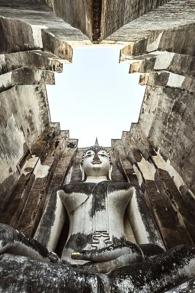 Thailand, Sukhothai Historical Park. Wat Si Chum temple with giant Buddha statue