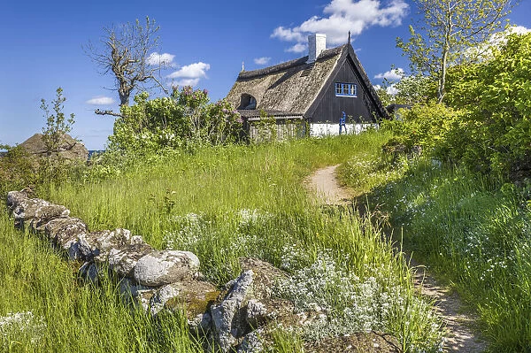 Thatched cottage on the coast at Listed, Bornholm, Denmark