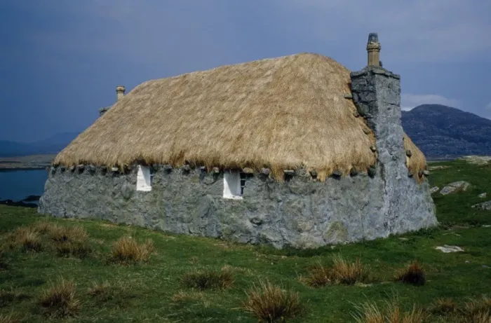 Framed Print : Thatched cottage on Loch Boisdale Framed Print : Thatched cottage on Loch Boisdale