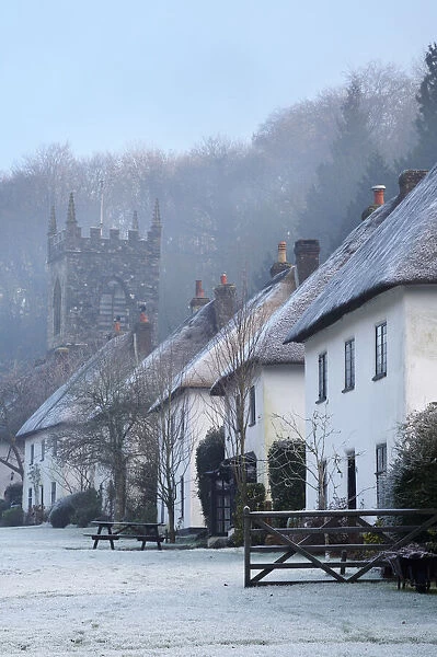 Thatched cottages at Milton Abbas in winter, Dorset, England