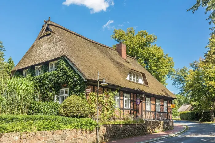Framed Print : Thatched historic half-timbered house in the village of Jesteburg, Luneburg Heath, Lower Saxony, Germany Framed Print : Thatched historic half-timbered house in the village of Jesteburg, Luneburg Heath, Lower Saxony, Germany