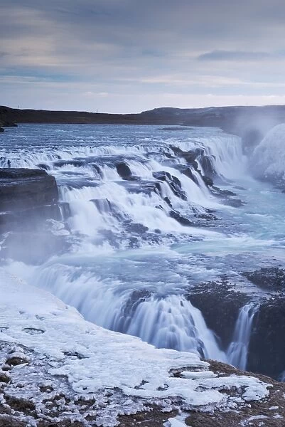 Thundering Gullfoss waterfall in winter time, Iceland, Europe. Winter (January)