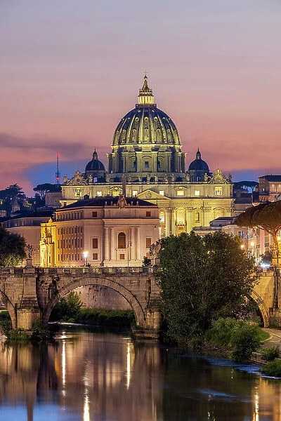 Tiber river and St. Peter's Basilica church at sunset, Rome, Lazio, Italy