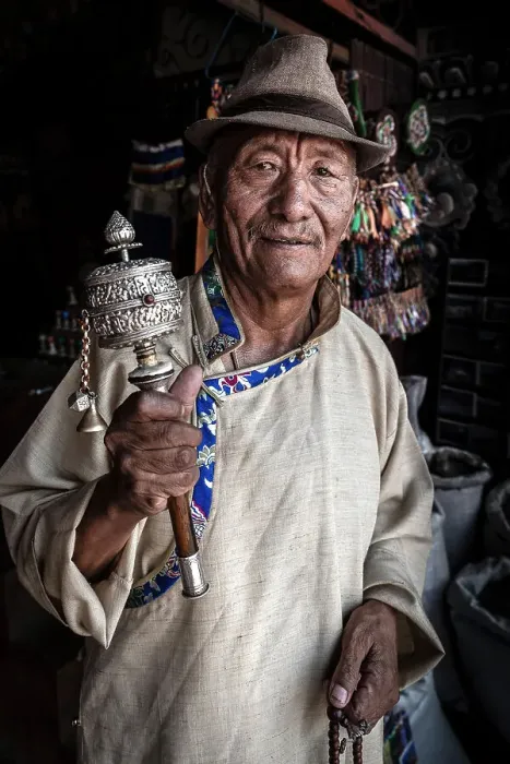 Framed Print : Tibetan man spinning prayer wheel at Boudhanath Stupa, Kathmandu, Nepal Framed Print : Tibetan man spinning prayer wheel at Boudhanath Stupa, Kathmandu, Nepal