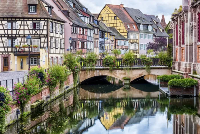 Framed Print : Timbered Buildings Reflecting in Canal, Colmer, Alsace, France Framed Print : Timbered Buildings Reflecting in Canal, Colmer, Alsace, France