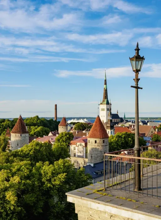 Framed Print : Toompea Hill Lookout Point, view over the Old Town towards St Olafs Church at sunset, Tallinn, Estonia Framed Print : Toompea Hill Lookout Point, view over the Old Town towards St Olafs Church at sunset, Tallinn, Estonia