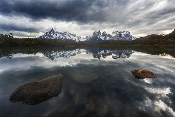 Torres del Paine mountain range during a cloudy sunrise, Patagonia, Chile
