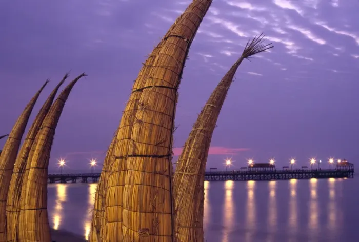Framed Print : Totora (reed) boats are stacked along the beach