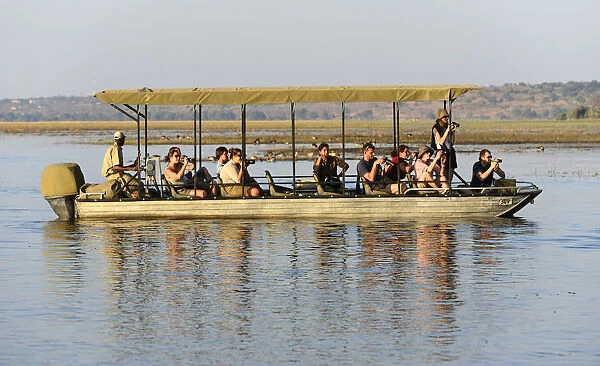 Tour boat on Chobe River near Kasane, Chobe National Park, Botswana, Africa