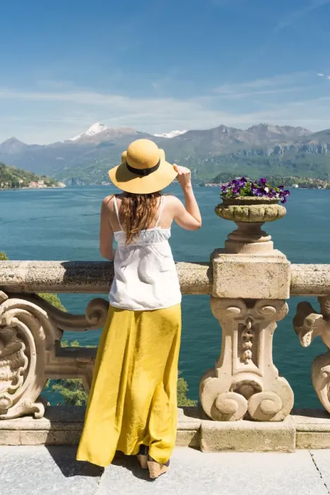 Framed Print : Tourist admiring Como lake view from the balcony of villa del Balbianello on punta